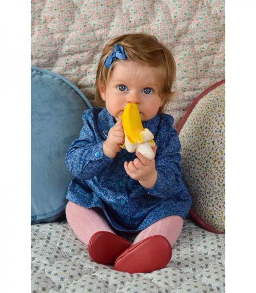 Kind mit Banane
